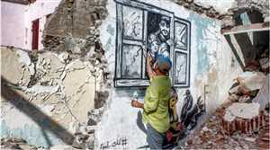 Yemenli sanatçı duvarlara çizdiği resimlerle savaşın trajedilerini anlatıyor