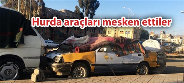 Yemen'de soğukların gelmesiyle evsizler hurda arabalara sığındı