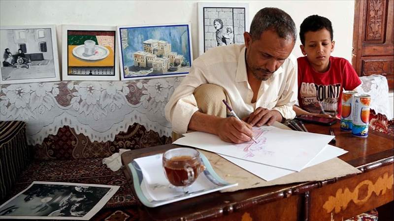 فنان يمني يخترق حاجز الصمت بالألوان (تقرير)